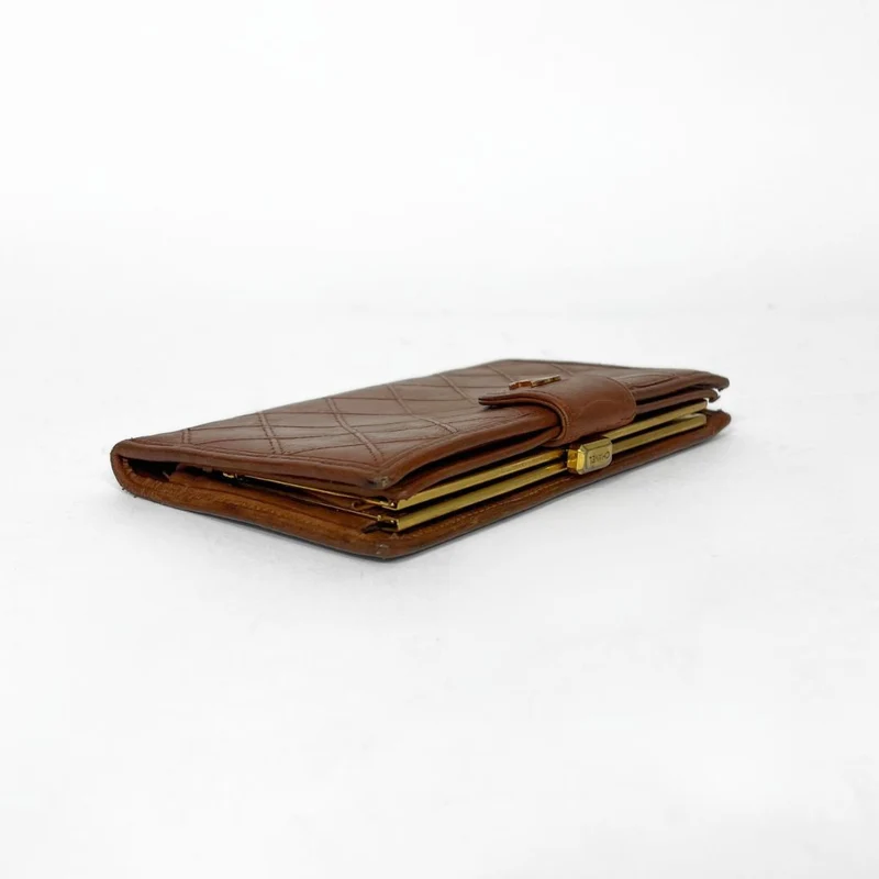 Chanel Gesteppte, zweifach faltbare lange Geldbörse aus Lammleder