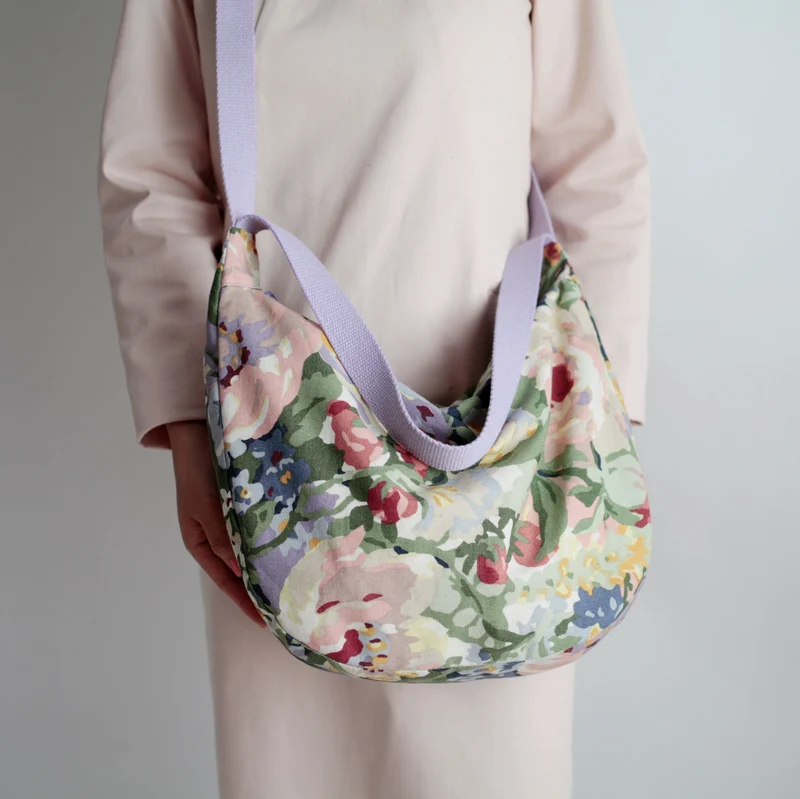Schultertasche POUCH Schwarz - Weiß