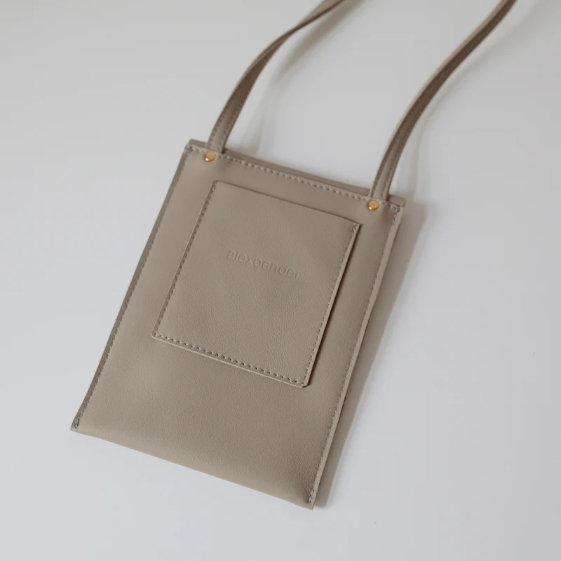 Handytasche/Minitasche Schwarz / Schwarz perforiert