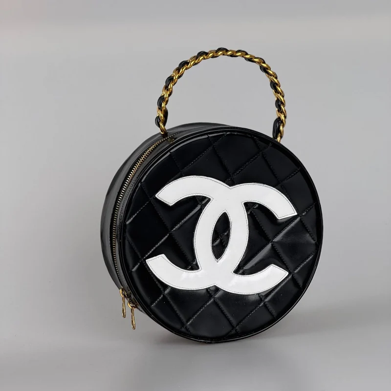 Chanel 1995 Schwarzer runder Kosmetikkoffer
