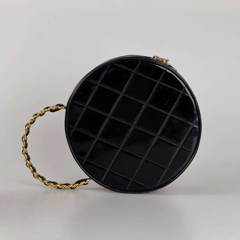 Chanel 1995 Schwarzer runder Kosmetikkoffer