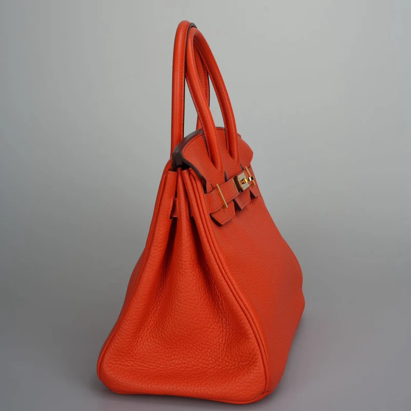 Hermes Birkin 30 Handtasche aus orangefarbenem Togo-Leder mit goldener Hardware