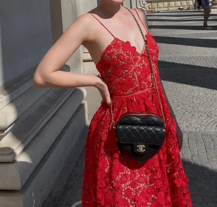 Chanel Große Herztasche aus schwarzem gestepptem Lammleder