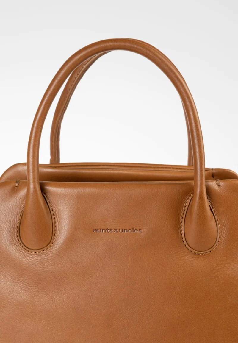 Aunts & Uncles Ease Of Mind Riemenhandtasche